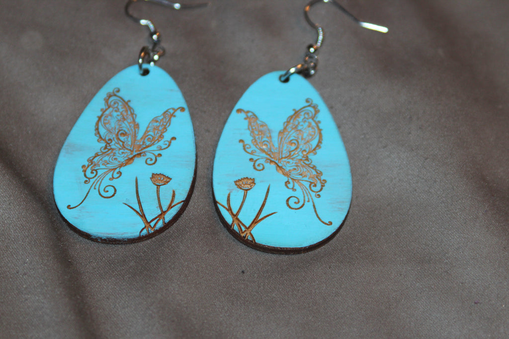 Light blue wooden butterfly earings